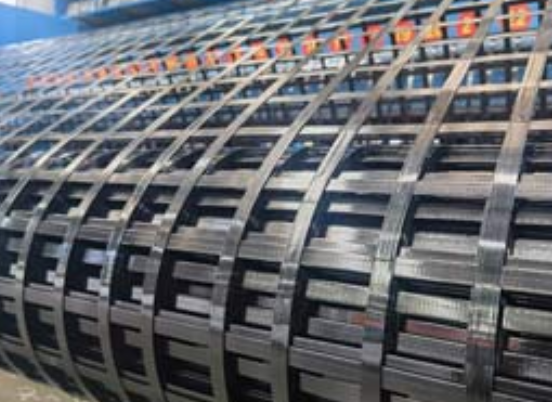 乌烈镇钢塑土工格栅：基建“隐形脊梁”的绿色智造与长寿命进化论